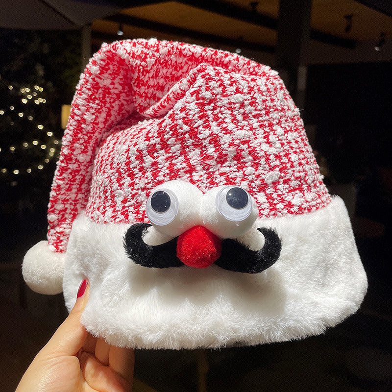 Red plush Christmas hat shaped with antler ears