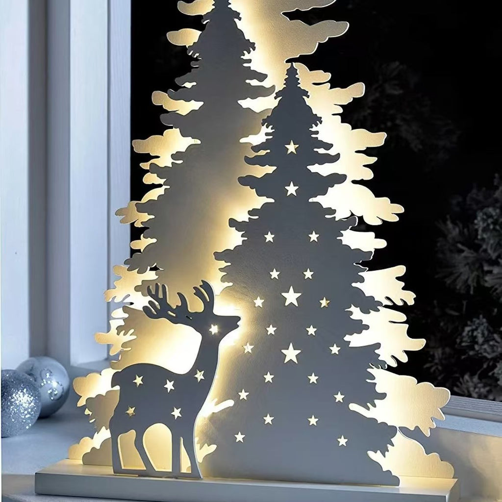 Lit wooden Christmas decoration with a switchable built in light source