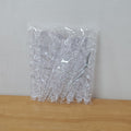 Colorless icicle ornament that suits green, white or colored trees