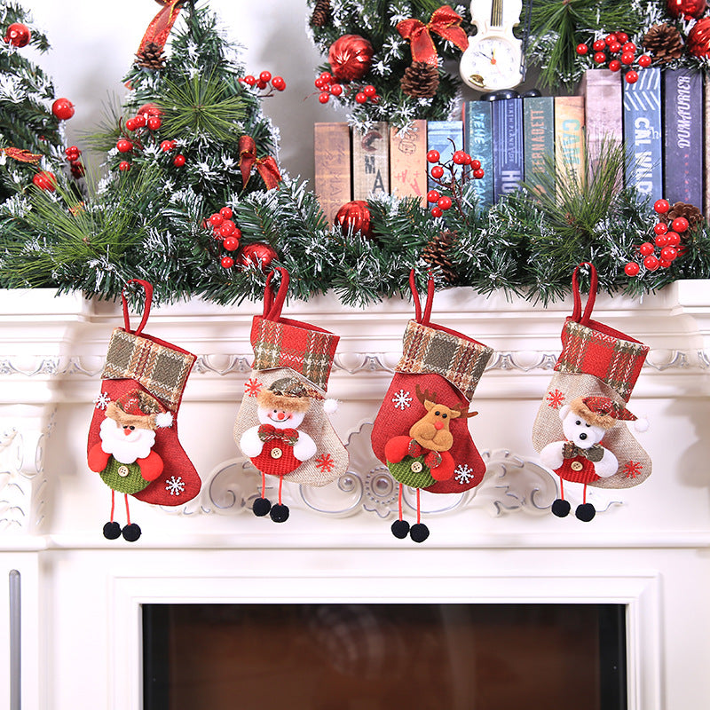 Plaid cloth Christmas stocking gift bag measuring 3.9 by 7.9 inches