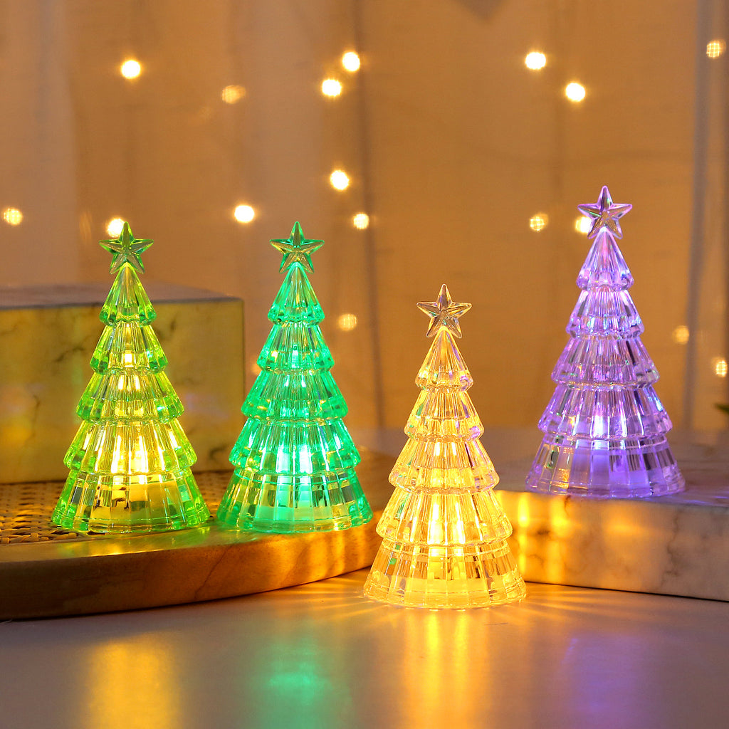 White faceted Christmas tree night light with a warm white glow