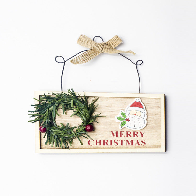 Square wood Christmas sign painted with Santa and a garland