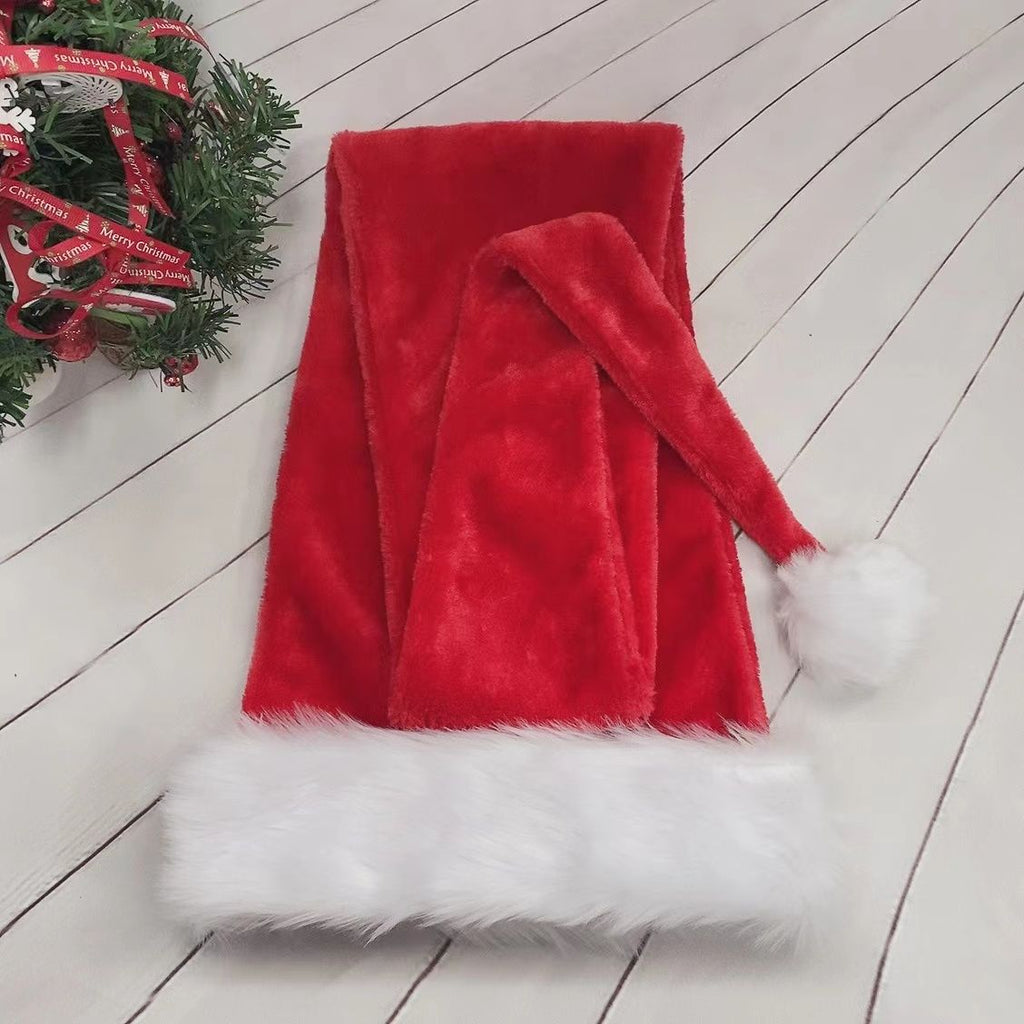Pink polyester Santa hat with an extra long tail