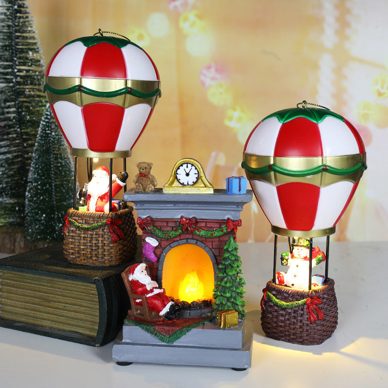Cast resin Christmas ornament with detailed balloon and basket molding