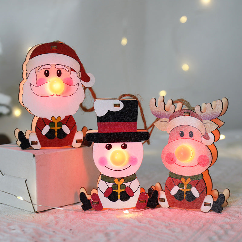 Red nose reindeer wooden Christmas ornament cut from timber rather than plastic