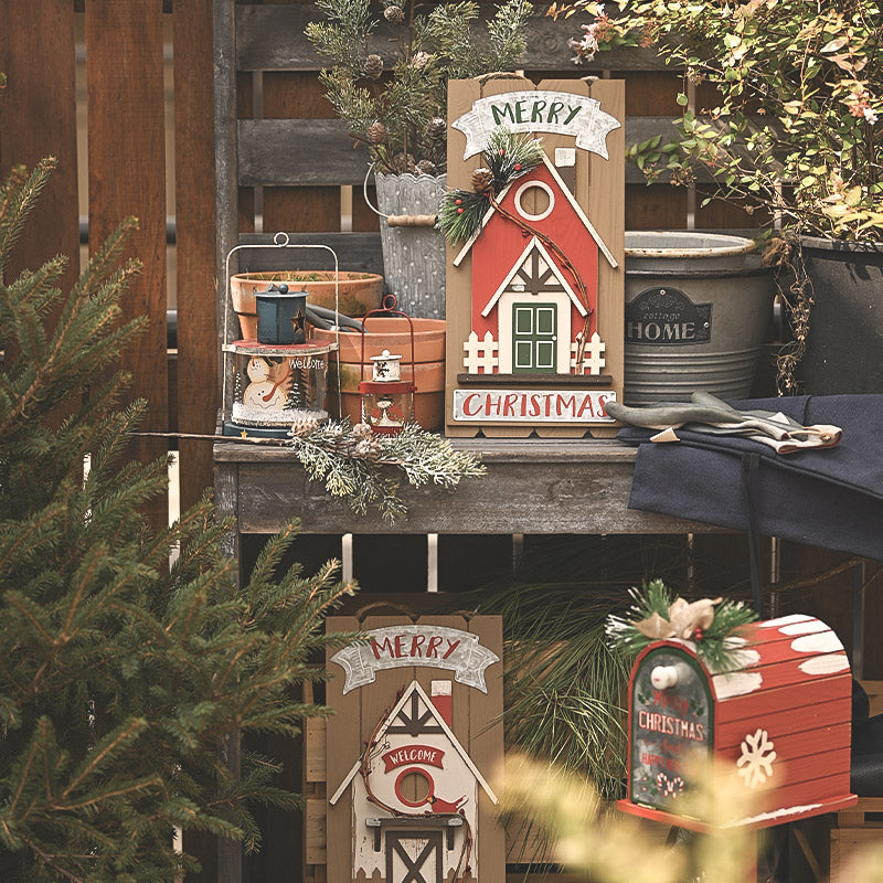 Cut wooden roof and window shapes on the house Christmas ornament