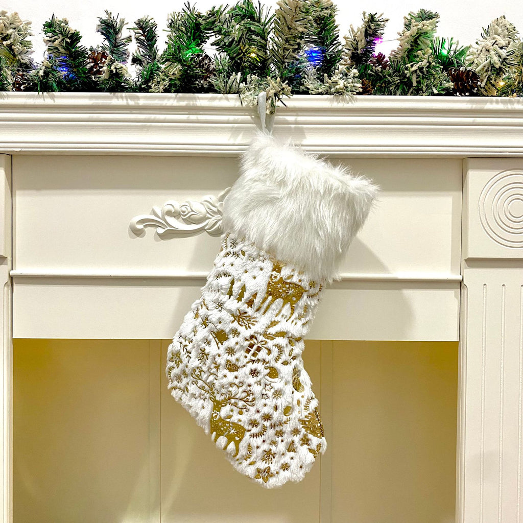 Soft cloth Christmas stocking with a gilded metallic finish on the front