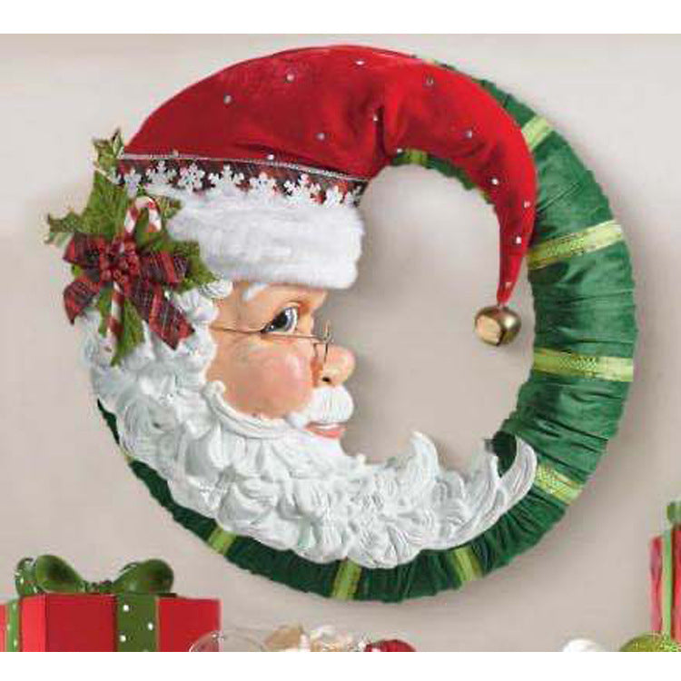 Sewn cloth Santa Christmas throw pillow with a white bearded motif